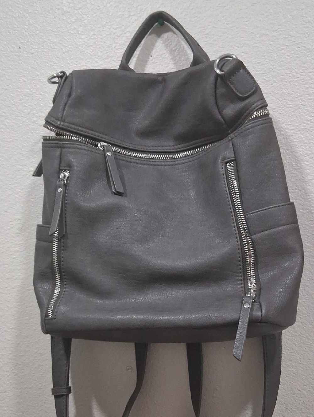 Modern Gray Leatherette Backpack with Zip Details